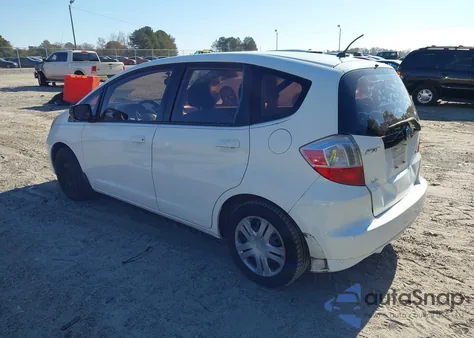2009 Honda Fit from USA, damaged, VIN JHMGE88229S009402